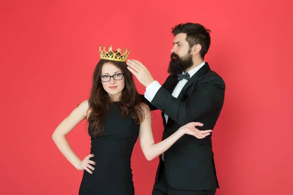 Prom queen. Bearded man crown sexy girl. Coronation party. Prom couple in formal style. Prom party. Holiday celebration. Pride and glory. Luxury reward. Future success. Ready for prom night