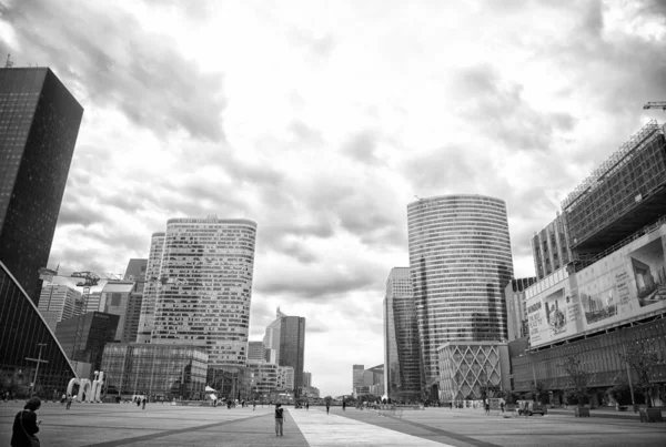 Paris, France - June 02, 2017: La Defense business district. Skyscrapers and buildings on cloudy sky. City square. Modern urban architecture. Traveling and wanderlust. Summer vacation — Stock Photo, Image