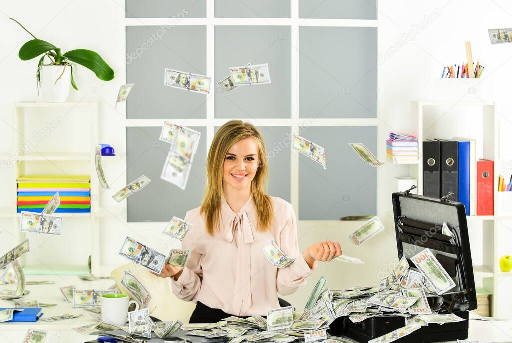 Finances is my passion. Girl with briefcase full of cash. Financial achievement. Business challenge. Accounting and banking. Smart blonde earn lot of money. Financial success. Financial expert