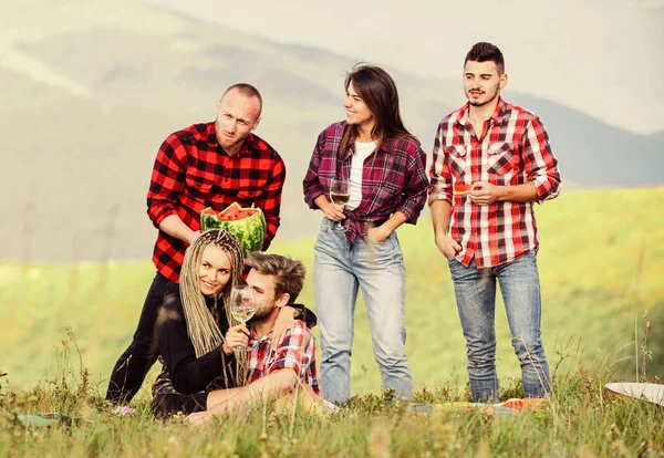 No rush. romantic picnic in tourism camp. summer vacation. group of people spend free time together. family camping. hiking adventure. happy men and girls friends eat watermelon. friendship — Stock Photo, Image