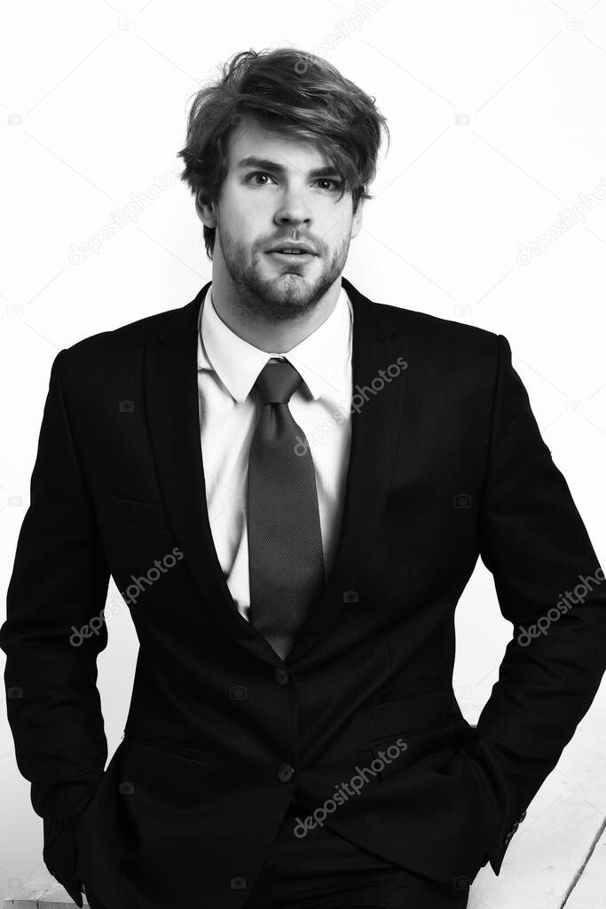 Caucasian stylish business man with moustache in elegant black suit