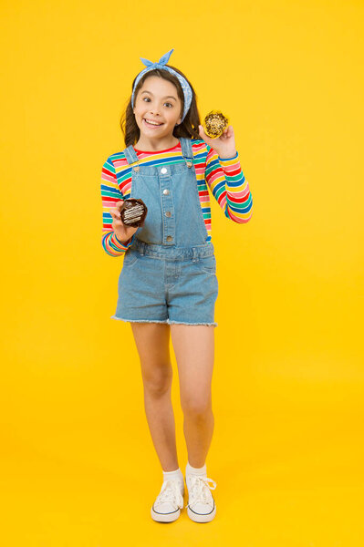 Healthy food is healthy life. child like cupcakes. delicious appetizing cake. gluten free recipe. cafe homemade food. happy childhood. summer vintage kid. sweet tooth child. little girl eating muffin