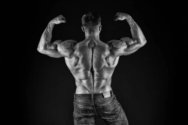 Installing muscles. Sportsman flex arms back view. Sportsman show biceps triceps. Strong sportsman or bodybuilder black background. Sport and fitness. Theres room for improvement in every sportsman — Stock Photo, Image