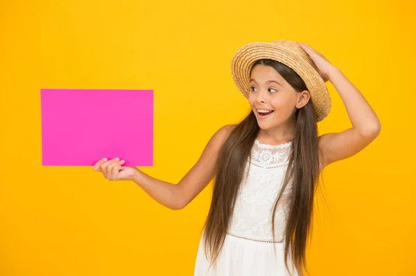 Cultural event. Creative event. I drew it. Art Exhibition. Gallery or Museum. Advertisement concept. Promoting tourism. Summer sales. Happy girl hold poster copy space. Vacation time. Girl straw hat