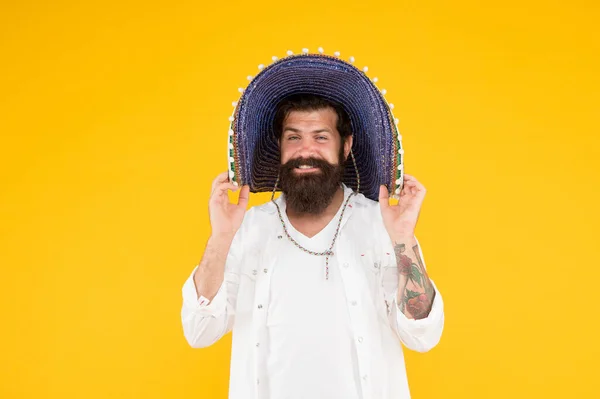 National holidays. Mexican hat sombrero. Guy happy festive outfit. Spanish costume. Mexican celebration. Travel to mexico. Man in mexican hat. Guy cheerful festive mood at party. Summer festival