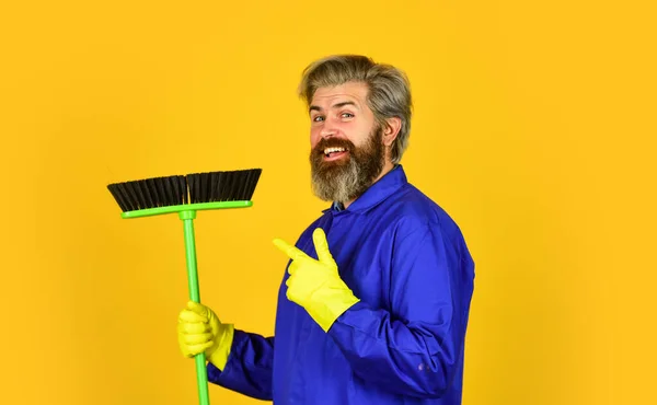 Work being hard. Janitor man sweeping. spring cleaning. cleaning service people. mature male worker with broom cleaning. Male Janitor clean With Broom. Man cleaning home with broom — Stock Photo, Image