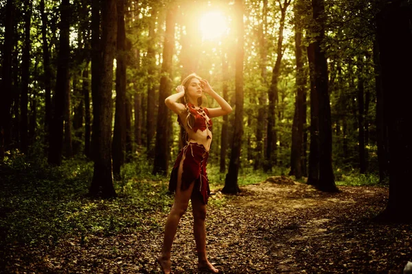 Wilderness of virgin woods. Female spirit mythology. She belongs tribe warrior women. Wild attractive woman in forest. Folklore character. Living wild life untouched nature. Sexy girl. Wild human