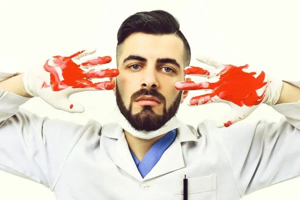 Surgeon showing his hands in blood — Stock Photo, Image