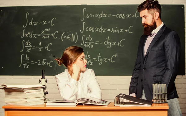 Demanding lecturer. Teacher strict serious bearded man having conflict with student girl. Man unhappy communicating. School principal talking about punishment. Conflict situation. School conflict — Stock Photo, Image