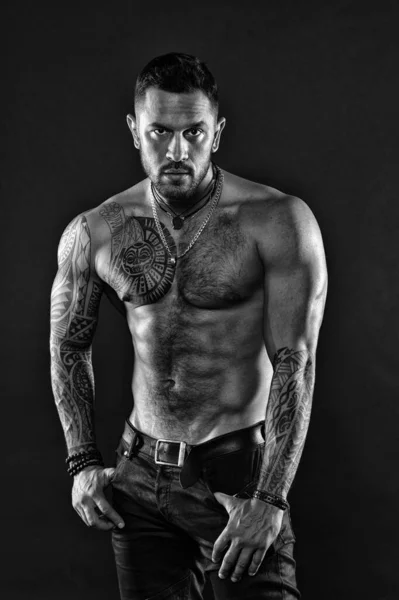 Be strong. muscular bodybuilder with body tattoo. athletic male show abdominal muscles. fitness model topless. healthcare lifestyle. body strong abs. Wild masculine beauty. macho. brutal and sexy — Stock Photo, Image