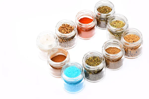 Set of seasoning making frame. Jars of spices on white — Stock Photo, Image