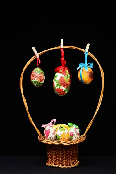 Traditional eggs decorated with bright color ornaments inside pottle — Stock Photo, Image