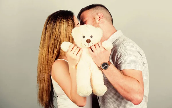 Feeling happiness. valentines day present. sexy girl and man hold teddy bear. man and woman embrace. family values. romantic relationship. love date. couple in love. family relations and happiness — Stock Photo, Image