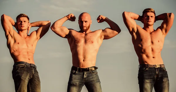 Showing abs and biceps. full of energy. Inspiring better health. three muscular men sky. athletic bodybuilders. sport concept. Sexy men with muscular body. Brutal macho. Strong men are sexy — Stock Photo, Image
