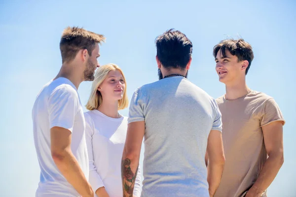 best friends. Summer vacation. Business team. Young people in casual style. group of four people, partnership. Group communication pleasure. Enabling effective communication. cheerful guys and girl