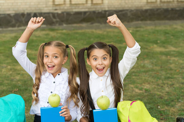 Food knowledge is health power. Happy kids celebrate Knowledge day. Back to school. September 1. School snack. Healthy and energy. Energetic diet. Knowledge and information. Knowledge is brain food