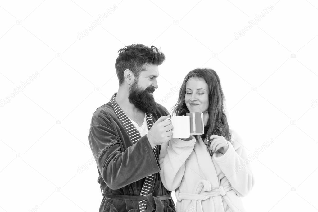 Enjoying the company of each other. perfect morning of love couple. Happy couple in bathrobes with coffee. happy romantic girl having breakfast with husband. couple lifestyle moments at home