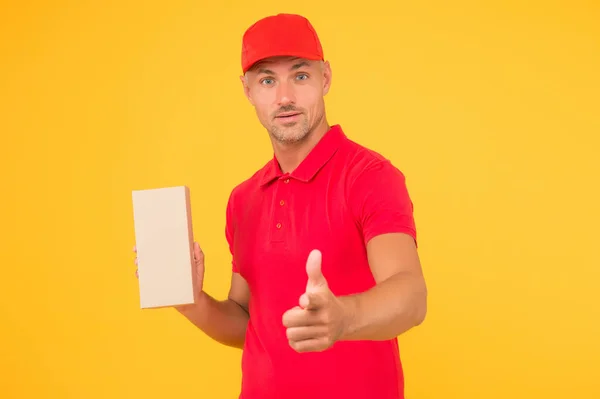 Cashier shop staff. Black friday. Express delivery courier. Parcel post package. Targeted Delivery Services. Freight transportation. Perfect delivery. Delivery man yellow background. Free services