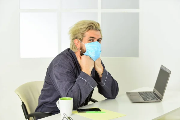 In order to prevent the spread. keep your distance. remote-based job. online shopping. man in respirator mask. work on a remote site. distance learning. infection control and prevention measures — Stock Photo, Image