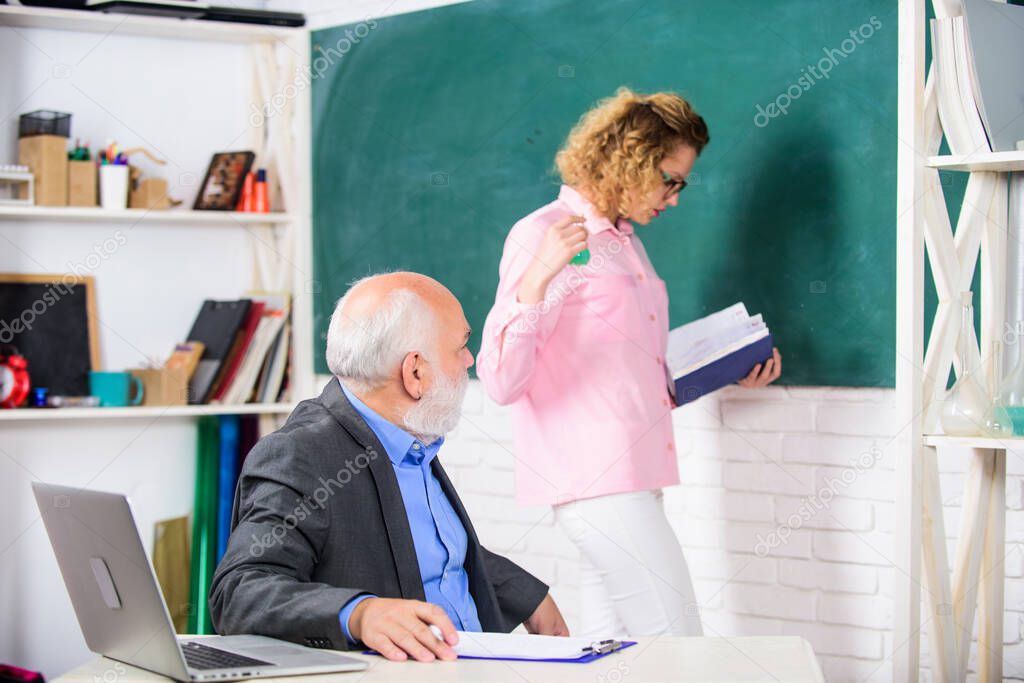 School team. student and tutor with laptop. pass exam. teachers room. student girl with tutor man at blackboard. College tutor. senior teacher and woman at school lesson