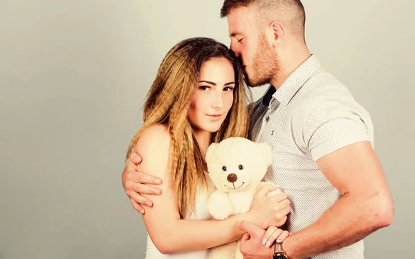 Passionate love. valentines day present. sexy girl and man hold teddy bear. romantic relationship. love date. couple in love. family relations and happiness. man and woman embrace. family values — Stock Photo, Image