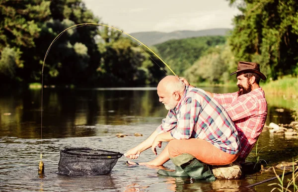 They are ready for the fishing. retired father and mature bearded son. big game fishing. relax on nature. happy fishermen friendship. Two male friends fishing together. fly fish hobby of men — Stock Photo, Image