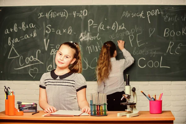 Using modern technologies. Little girls scientist work with microscope. Biology science. Happy little girls. science experiments. Chemistry research. Little girls in school lab. Science is future — Stock Photo, Image