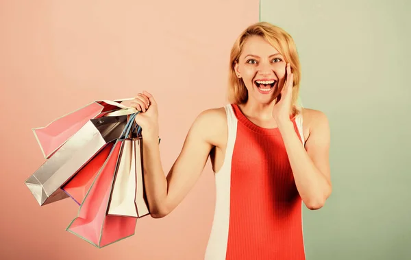 Discounts and loyalty program. Real sale. Woman on shopping tour. Girl with paper bags. Black friday concept. Happy shopping day. Retail and consumerism. Ecology impact. Satisfied with her shopping — Stock Photo, Image
