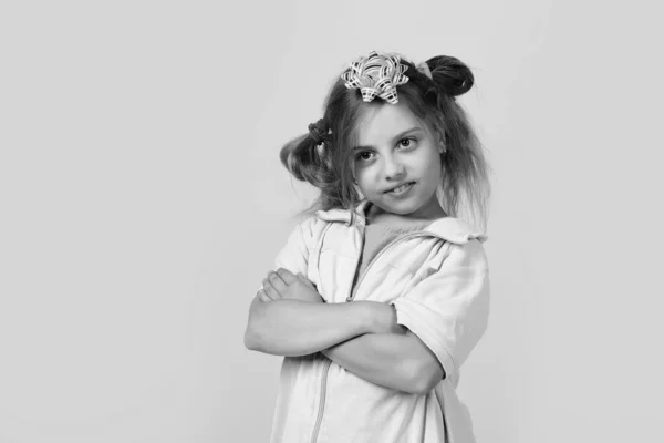 Holiday and present concept. Kid with cute pink bow — Stock Photo, Image