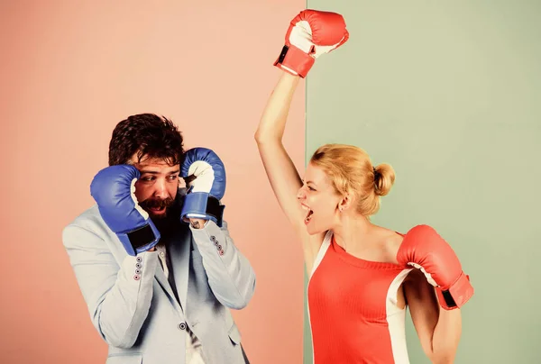Relations as struggle concept. Strength and power. knockout punching. who is right. win the fight. bearded man hipster fighting with woman. family couple boxing glove. problems in relationship. sport