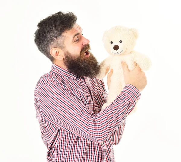 Kindness, care and tenderness concept. Hipster cares about teddy bear. — Stock Photo, Image