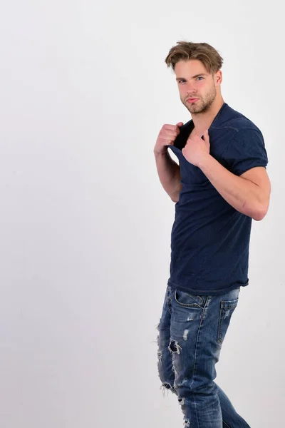 Guy in dark blue tshirt and jeans. Confidence and emotions — Stock Photo, Image