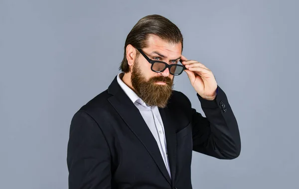 mature man wear glasses. confidence and charisma. handsome man wear office suit. male beauty and fashion. brutal businessman with perfect beard and moustache. real boss in jacket. he got great style