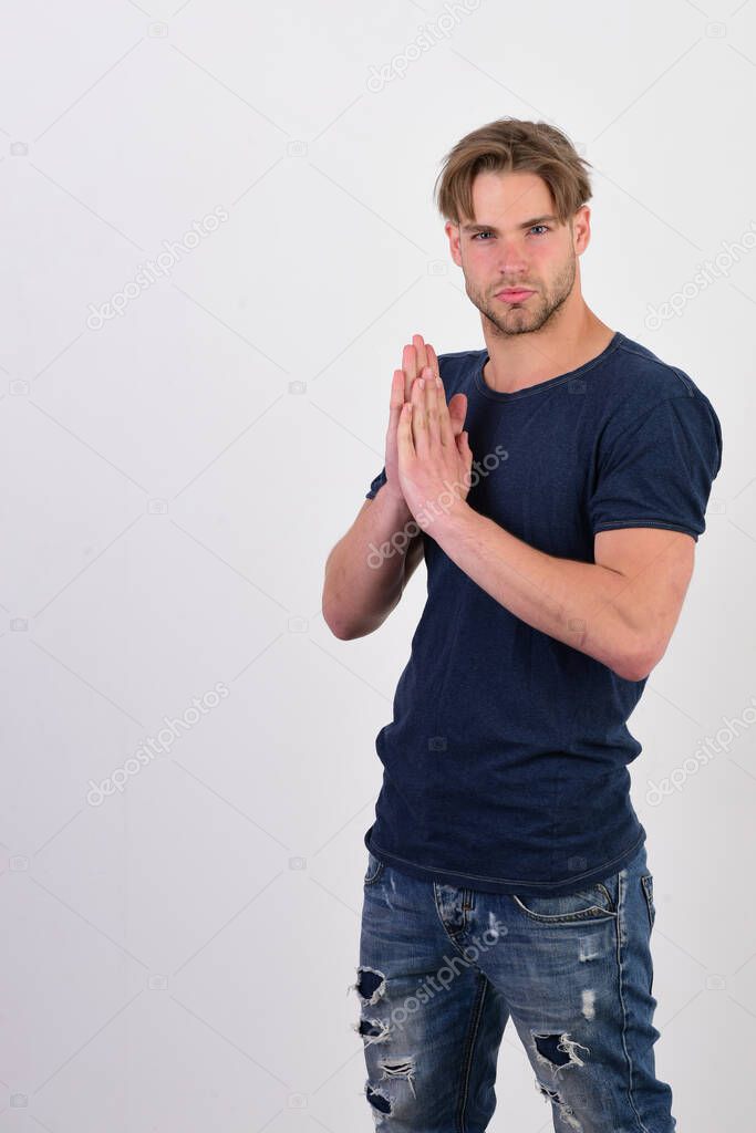 Man with fair hair on white background. Masculinity and confidence