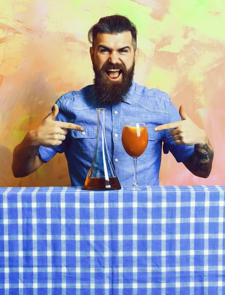 Brutal caucasian hipster with alcohol cocktail and flask — Stock Photo, Image