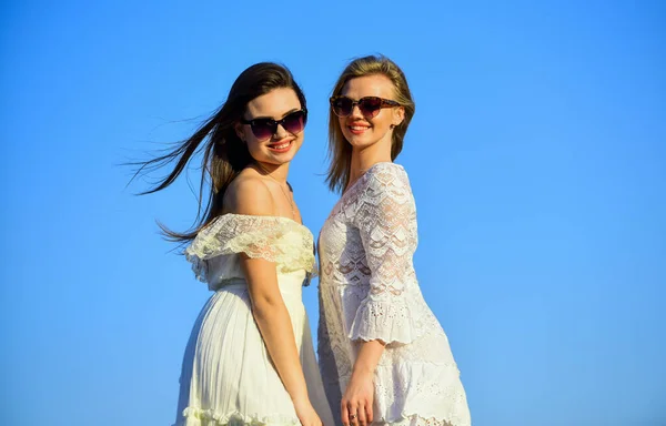 Sisterhood and female community. Female friendship. Female power. Summer fashion. Find woman inner strength. Harmony and balance. Psychology concept. Beautiful women on sunny day blue sky background — Stock Photo, Image