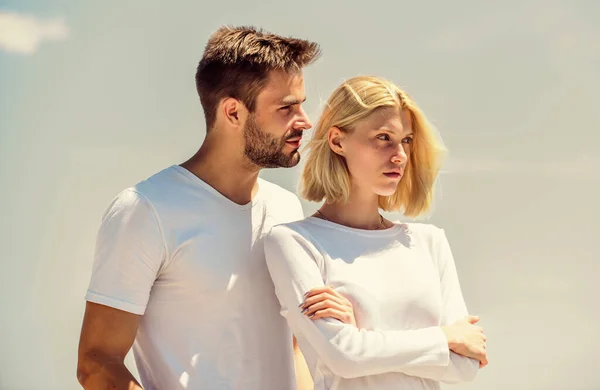 Communication problems. Summer romance. Family love. Devotion and trust. Love story. Man and woman white clothes sunny day outdoors. True love. Romantic relations. Couple in love blue sky background