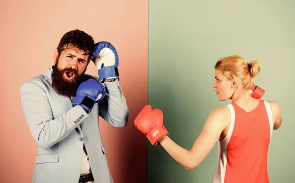 Couple in love fighting. problems in relationship. sport. bearded man hipster fighting with woman. family couple boxing gloves. knockout punching. who is right. win the fight. Strength and power — Stock Photo, Image