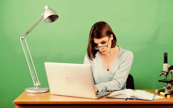 Searching information. Girl pretty attractive student with laptop. Modern student girl. Education concept. Student life. High school education. Online remote classes. Teacher preparing for lesson