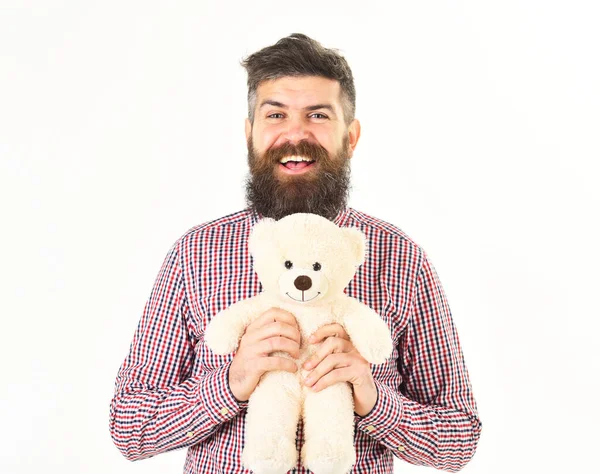 Hipster in fashioned shirt with teddy bear. — Stock Photo, Image