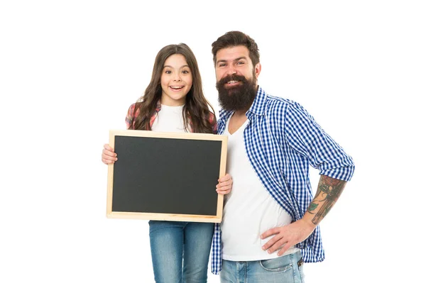Advertising or promotion. Father and daughter hold chalkboard copy space. Girl with dad on white background. International childrens day. Happy childhood. Family news. Sale and discount. We love it — Stock Photo, Image