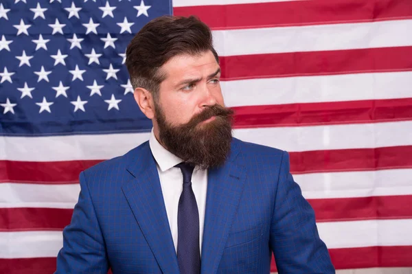 TV host. American reform. July 4. American citizen usa flag. American citizen. Happy celebration of victory. Bearded hipster man being patriotic for usa. National holidays. Proud of motherland