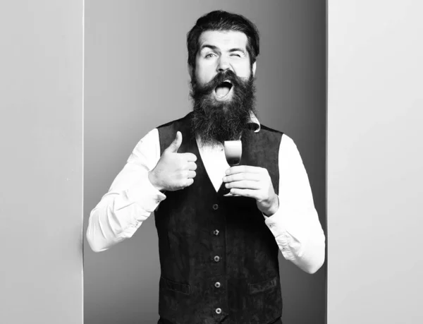 Funny handsome bearded man on colorful studio background, copy space — Stock Photo, Image