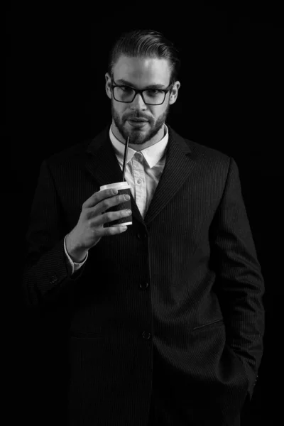 Business man in black suit on black background — Stock Photo, Image