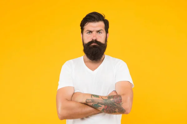 Bushy beard hipster man barbershop client yellow background, facial hair cosmetics concept — Stock Photo, Image