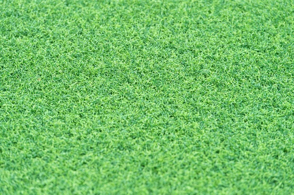 Fondo de hierba verde. Textura de hierba verde para el fondo. Patrón de césped verde y fondo de textura. Primer plano. concepto de reciclaje ecológico. Cubriendo el campo de fútbol. Protección medioambiental —  Fotos de Stock