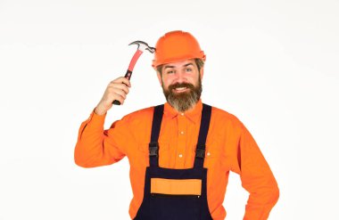Çekici doğru kullanmak için gerekli ipuçları. Projeler için gereksinimler. Profesyonel tamir çatısı. Teknik işler. Üniformalı olgun sakallı bir adam. Çekiçli adam. Güzel çekiç. Değişiklikler için dürtü