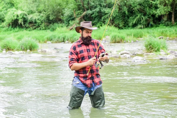 Best day ever. bearded fisher in water. fisherman show fishing technique use rod. mature man fly fishing. man catching fish. hobby and sport activity. summer weekend. Happy fly fishing — Stock Photo, Image