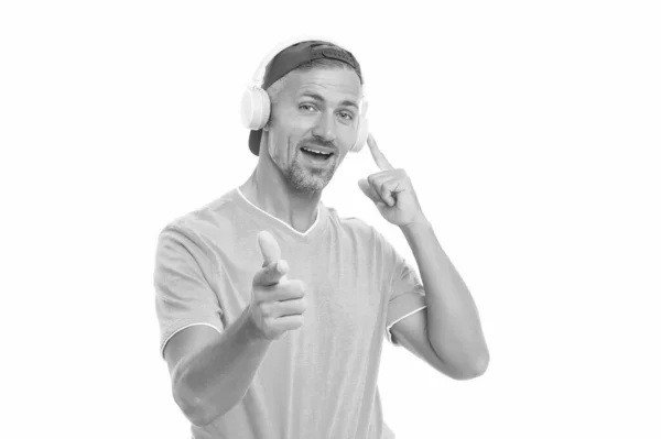 Make sound loud. Happy man point finger in earphones. Unshaven guy listen to sound track. Enjoying music playing in earphones. Hi-Fi stereo sound. New technology. Modern life. Digital sound — Stock Photo, Image