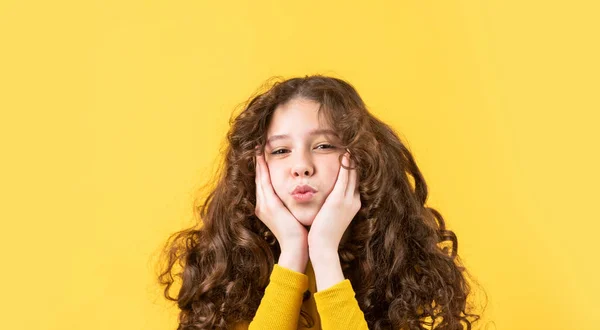 Little child curly hair. Hairdresser supplies. Brushing long hair. Enjoying shiny curls. Fashion and beauty. Professional cosmetics. Freedom self expression. Girl hairdresser salon. Hairstyle party — Stock Photo, Image